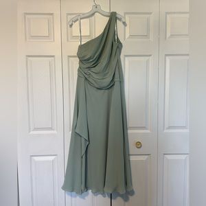 David’s Bridal Dusty Sage mesh one-shoulder bridesmaid dress with full skirt.